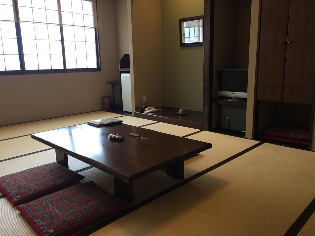 Higashikawa Asahidake Yumoto Yukomanso חדר תמונה